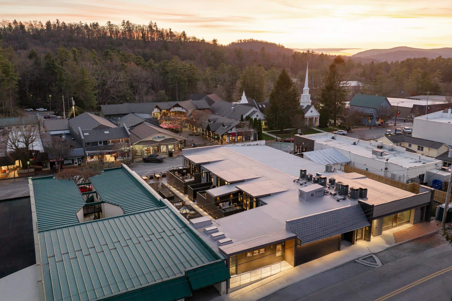 G. Shared Patio 5 - Drone Overhead toward downtown sunset